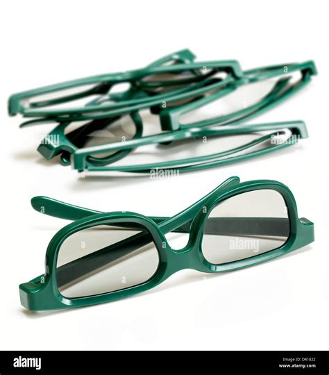 Pair of green 3d polarized glasses for watching 3-d movies in cinema ...