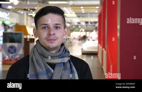 Portrait Of A Young European Guy In A Shopping Mall In Winter Close Up