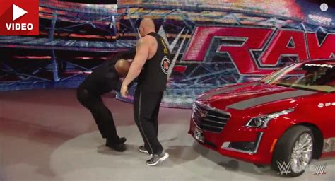 Watch WWE’s Brock Lesnar Destroy A $55k 2015 Cadillac CTS With An Axe | Carscoops