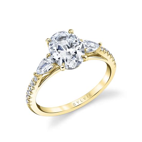 Oval Engagement Ring With Pear Side Stones Three Stone Rings