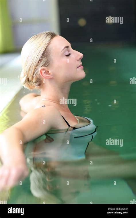 Beautiful Blond Woman Relaxing In Spa Pool Stock Photo Alamy