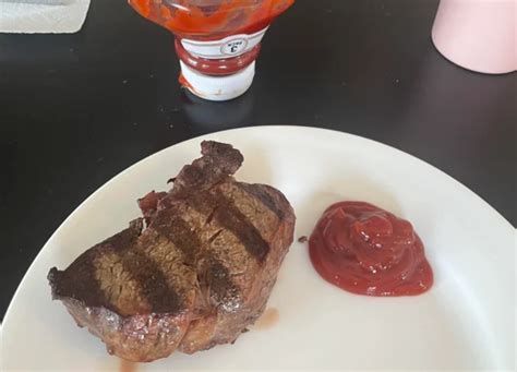 Sinner Woman Eating Prime Filet Mignon With Ketchup Sparks Debate