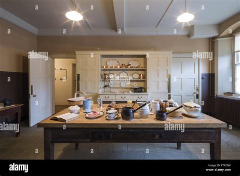 A Display Of Crockery And Other Objects On The Kitchen Table At Standen