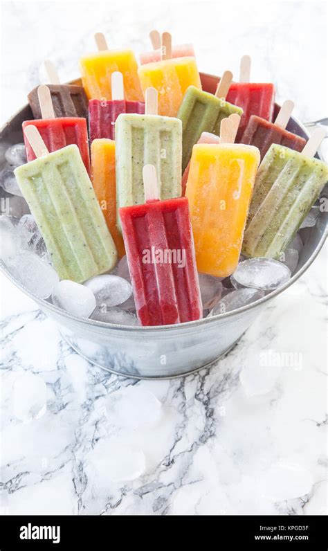 Homemade frozen ice cream popsicles in various flavors Stock Photo - Alamy