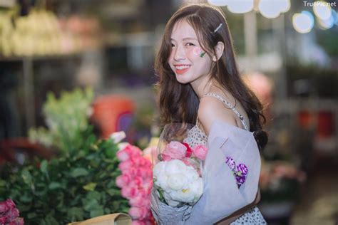 Vietnamese Hot Girl Linh Hoai Strolling On The Flower Street