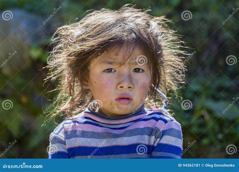 Portrait Nepali Child On The Street In Himalayan Village Nepal