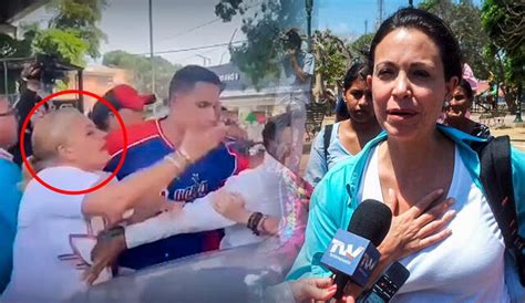 Maria Corina Machado Mujer Intenta Agredirla Rumbo A Un Acto De