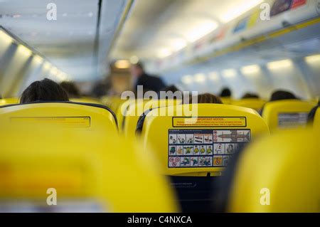 Ryanair Boeing 737-800 interior view with passengers, shallow DOF Stock Photo - Alamy