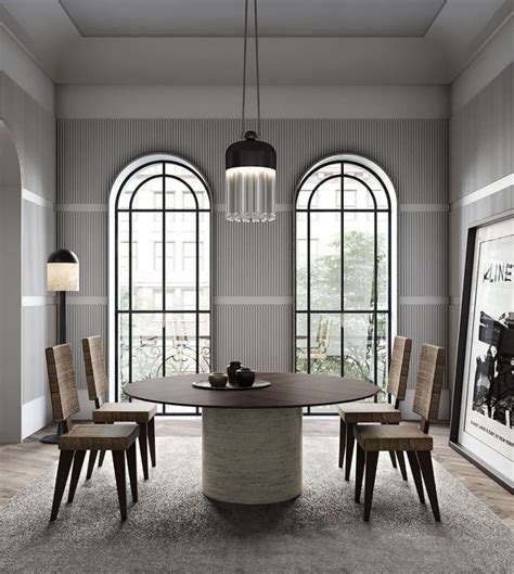 A Dining Room Table Surrounded By Chairs In Front Of Large Windows