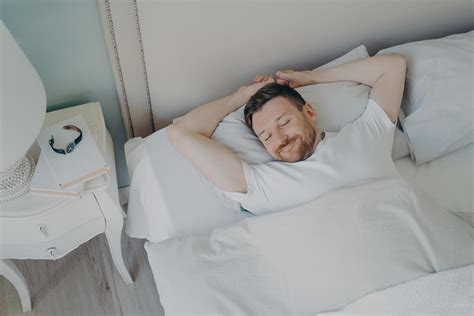 Young Happy Relaxed Caucasian Man Sleeping In Bed 7662949 Stock Photo