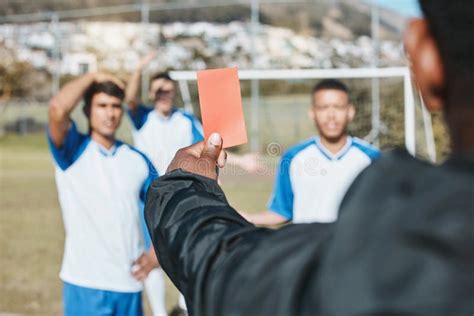 Sports Team Red Card And Soccer Referee Outdoor On Field For Game Foul