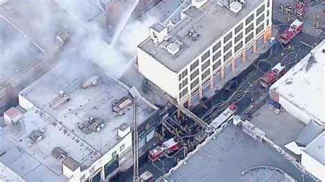 Multiple firefighters injured as Downtown LA building explodes into ...