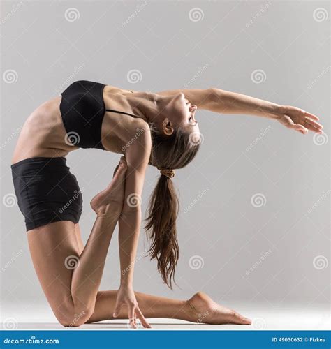 Yogi Gymnast Girl Doing Asana Ustrasana Or Camel Pose Stock Photo