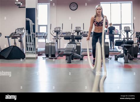 Battling Ropes Girl At Gym Workout Exercise Fitted Body Stock Photo Alamy