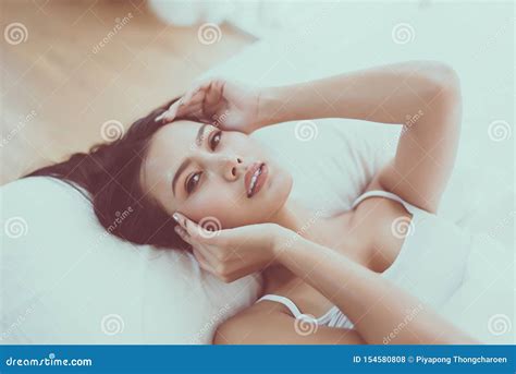 Portrait Of Pretty Asian Woman Lying Down On Bedroom Sexy Female And