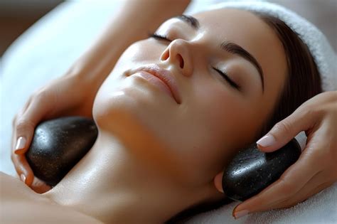 Relaxing Hot Stone Massage Therapy Session At A Wellness Spa Premium AI Generated Image