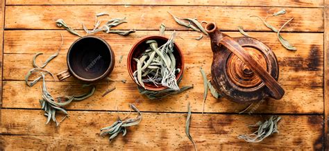 Premium Photo Herbal Sage Teadry Sage Leaf On Retro Wooden Table