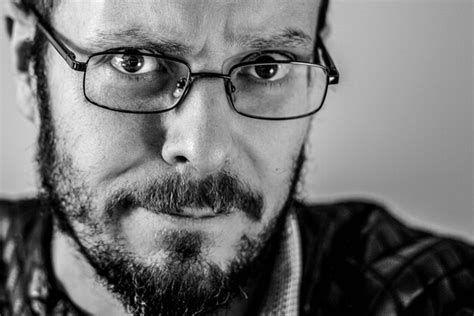 Premium Photo Close Up Portrait Of Man Wearing Eyeglasses