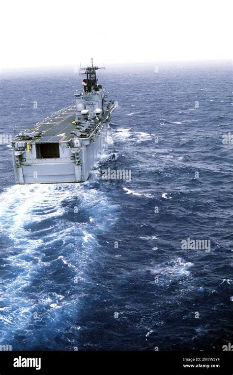 A Stern View Of The Amphibious Assault Ship Uss Nassau Lha Underway