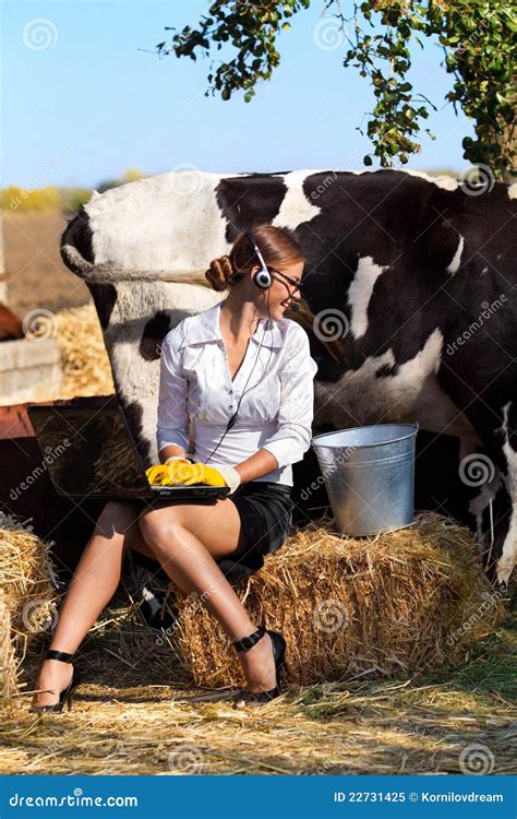 Business Woman With Laptop Milking Cow On Farm R Wtfstockphotos