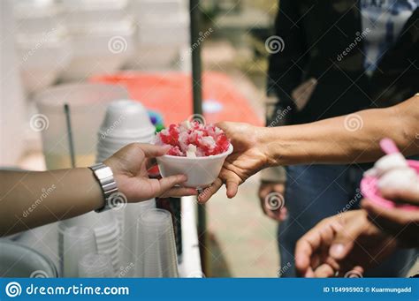 Charity Food Is Free For People In Slums Hands Of Volunteers Serves