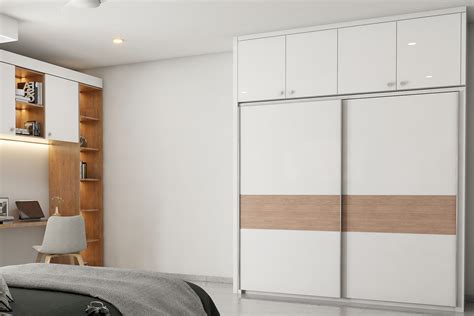 Spacious Sliding Door Wardrobe Deign With Chrome Knobs | Livspace