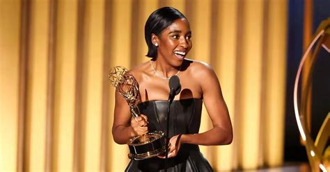 The Bear Actress Ayo Edebiri Has The Voice Host Hold Bag As She Accepts Historic Emmys Win