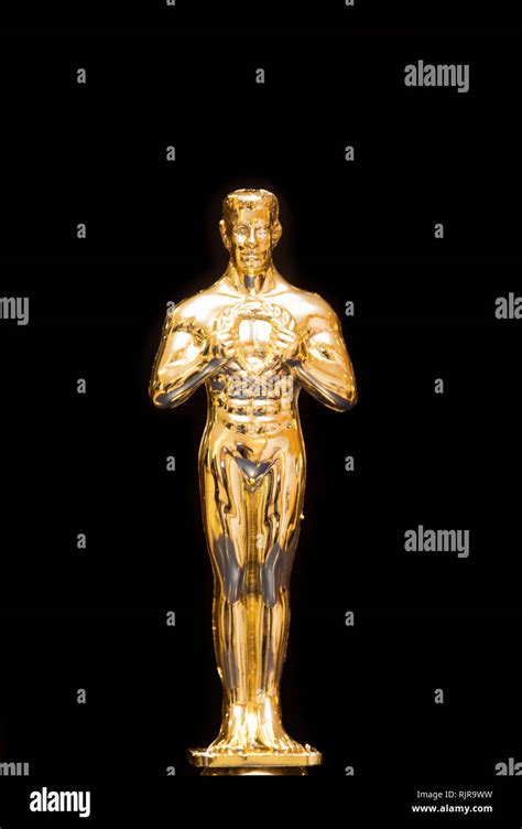 A golden Oscar replica trophy Stock Photo - Alamy