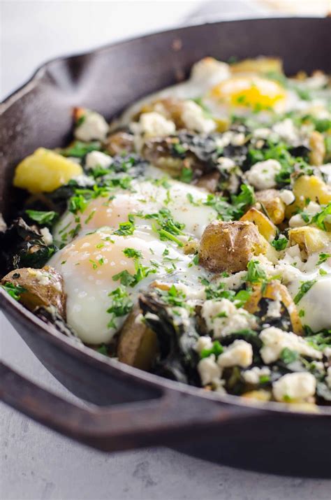 Baked Eggs With Potatoes And Kale In A Cast Iron Skillet Recipe Baked Eggs Recipe Baked