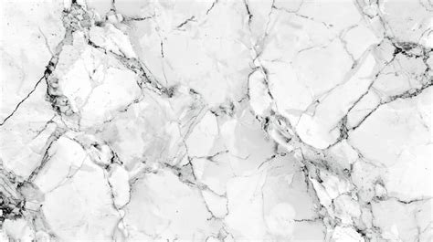 Premium Photo A White Marble With Black And White Marbles Background