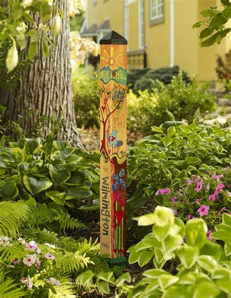 10 Most Creative Garden Poles Ideas To Increase Your Garden Beauty