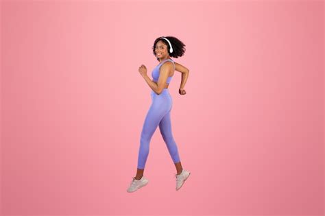 Premium Photo Glad Millennial African American Lady In Sportswear