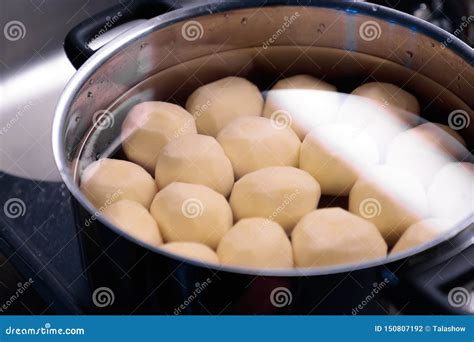 Peeled Potatoes In A Saucepan With Water Close Up Stock Photo Image