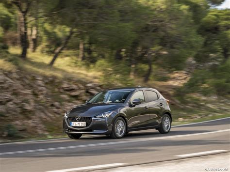 2020 Mazda2 (Color: Machine Grey) - Front Three-Quarter | Caricos