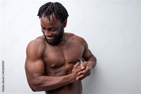 Positive Black Man With Beautiful Torso Showing Arms Biceps Isolated On White Background Naked