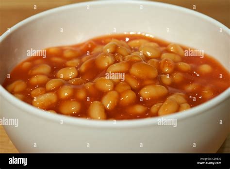 Plastic Bowl Of Baked Beans In Tomato Sauce Ready For Microwave Cooking