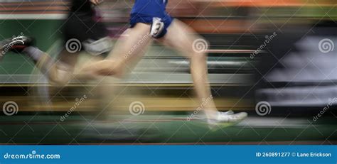 Running a Relay Race on Tract Holding Baton Stock Image - Image of ...