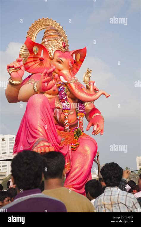 People at religious procession during Ganpati visarjan ceremony, Mumbai, Maharashtra, India ...