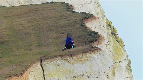 Photos Show Woman Sat On Dangerous Cliff Edge Amid Warnings Itv News