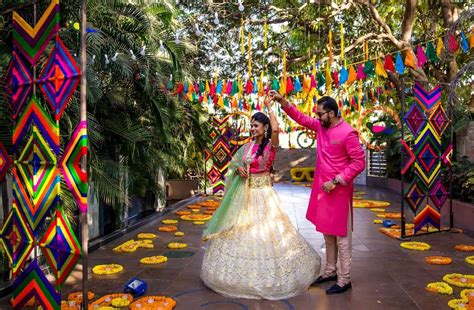 Mela Themed Colorful Mehndi Sangeet Wedding Photography Ahmedabad ...