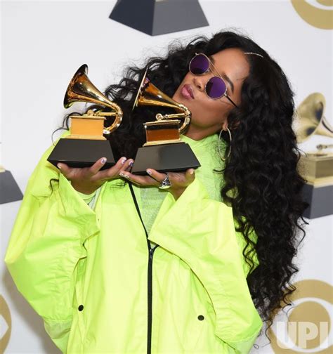 Photo: H.E.R. wins awards at the 61st Grammy Awards in Los Angeles ...