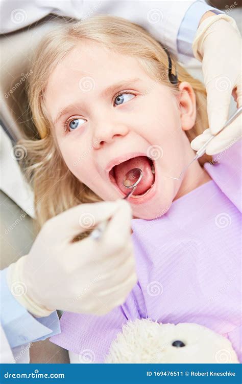 Girl with Open Mouth at the Pediatric Dentist Stock Image - Image of ...