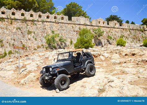 A Huge Black Jeep Near The Old Fortress Stock Image Image Of Castle