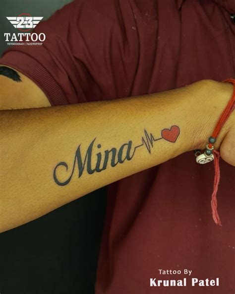 Minaa Tattoo with Heart Design