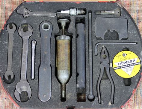 A Jaguar Mk 2 Tool Kit In Original Red Box With A Part Mk 2 Kit In