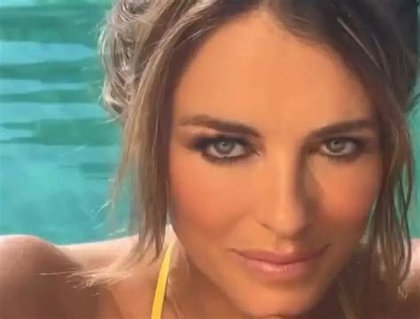 With A Tiny Yellow String Bikini Liz Hurley Dazzles In New Video When She Took A Dip In The Ocean