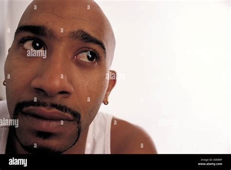 Bold black man portrait Stock Photo - Alamy