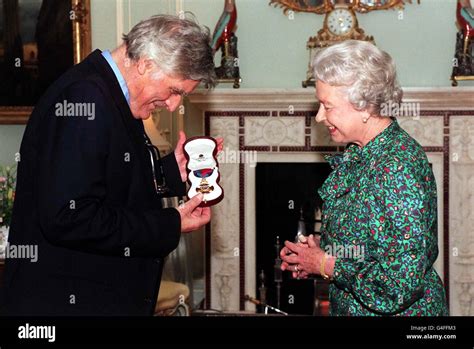 Poet Laureate Ted Hughes Receiving The Insignia Of A Member Of The