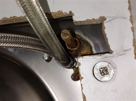 Kitchen faucet leaks from under the sink : r/Plumbing