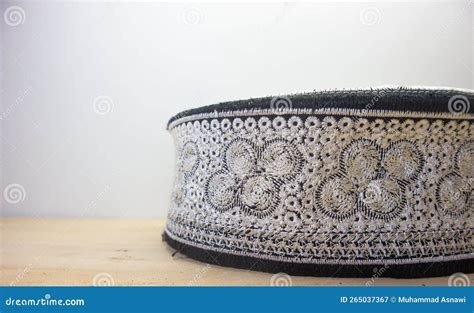 White Islamic Caps with Black Patterns are Usually Worn by Muslim Men ...